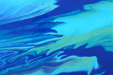 art photography of abstract marbleized effect background. Blue and mint creative colors. Beautiful paint.