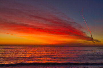 Missile launch at sunset from Vandenberg Air Force base in California