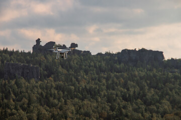 quadrocopter soars over the forest