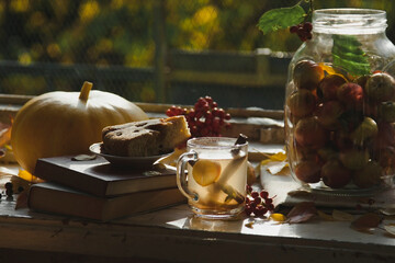 cup of tea. books. pumpkin 