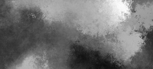 Black and white gritty grunge painted overlay background paper texture with grey monochrome stains of paint and dusty old pattern in abstract banner wallpaper backdrop