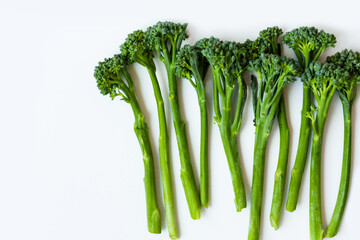 Fresh broccolini isolated on white background with copy space.
