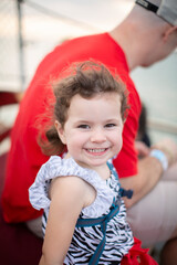 Fototapeta na wymiar Cute little girl on a boat