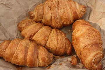 Delicious fresh croissants on a picnic macro
