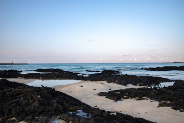 calm sea and clear sky and cloud landscape at jeju island korea 