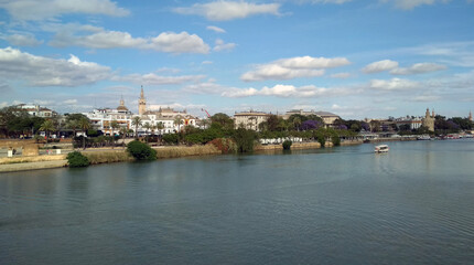 Fototapeta na wymiar View of Seville historic center from the Bridge of Isabella II