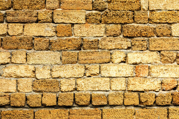Abstract decorative wall of natural stone. Background, limestone wall texture, shell rock blocks. Great background or texture. Landscape style