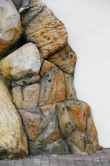 creative background stone wall with large natural stones, unusual background for creative design
