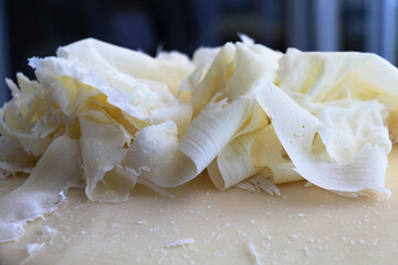 Italian cheese at a private party. Cheese scraped and presented in small and thin sheets