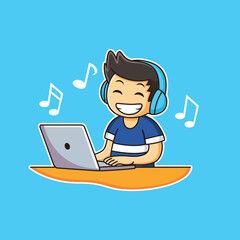 boy in headphones playing music on laptop with happy expression
