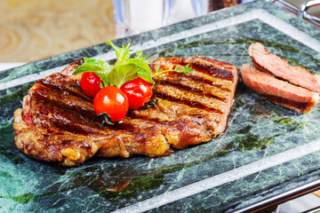 grilled meat with tomatoes. As backdrop for menus, cookbooks, advertisements and other culinary projects