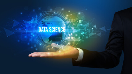 Elegant hand holding DATA SCIENCE inscription, digital technology concept