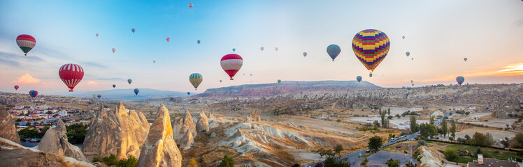 Hot air balloon flying at sunrise time, Cappadocia, Turkey - obrazy, fototapety, plakaty