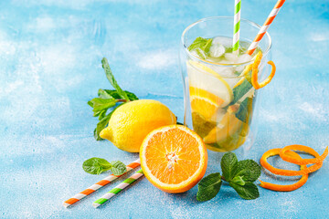 Refreshing cocktails with mint with lemon, orange, mint and ice