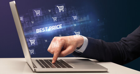 Fototapeta na wymiar Businessman working on laptop with BEST PRICE inscription, online shopping concept