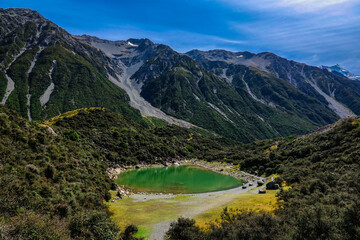 Fototapeta na wymiar Colourful Blue Lake on the Tasman Lake Track, Aoraki Mount Cook National Park, Canterbury, South Island, New New Zealand