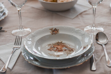 Restourant's table cutlery set with empty plate