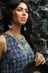 Beautiful smiling young south girl boho style clothing and jewelry