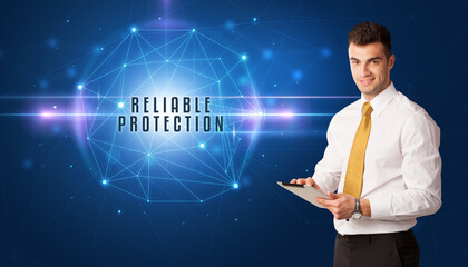 Businessman thinking about security solutions with RELIABLE PROTECTION inscription