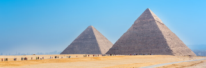 The pyramids at Giza in Egypt. Web banner in panoramic view.