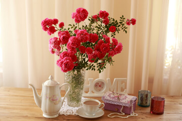 summer morning with the scent of roses and tea with milk