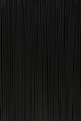 Obraz premium Black textured surface. Abstract black background. Spaghetti. Vertical frame