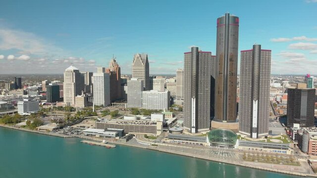 Sunny Mid Day Aerial City Of Detroit From Above Detroit River