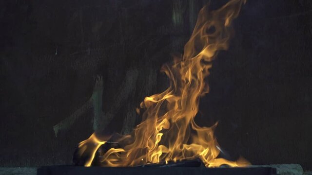 
This is a flame of fire on a grunge background.