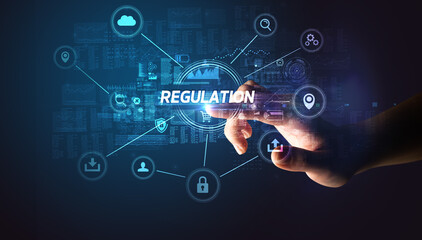 Hand touching REGULATION inscription, Cybersecurity concept