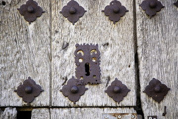Old lock on a wooden door