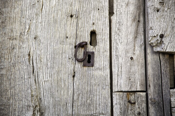 Old broken wooden door