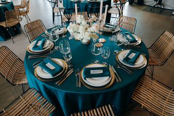 The Concept Of Wedding Decor. Gold and hunter green decor