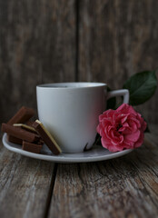 cup of coffee and rose