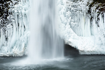 Horsetail falls  after a winter snow and ice storm.  The falls is in the Columbia River Gorge...