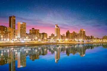 Durban city beachfront buildings lit up at night