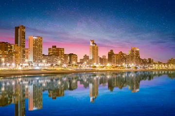 Fotobehang Afrika Durban city beachfront buildings lit up at night  © Arnold
