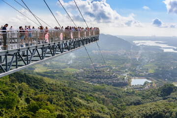Panorama glass bridge. Rainforest cultural tourism zone Yanoda, Hainan island, Yalong Bay Tropical...