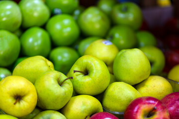 red and green apples on the market