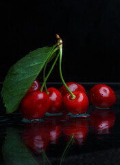 cherries on a black background