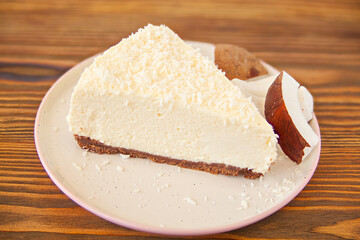delicious cheesecake with coconut on  plate