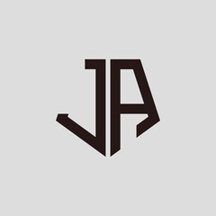 J A black pentagon initials with a gray background