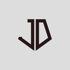J D black pentagon initials with a gray background