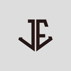 J E black pentagon initials with a gray background