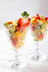 Fresh fruit salad in glass cups