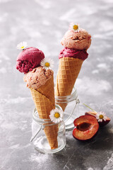 Summer fruit and berry ice cream in cones