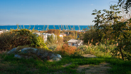 Fototapeta na wymiar The view of the Feodosian harbour from the hills neaby. Crimea.