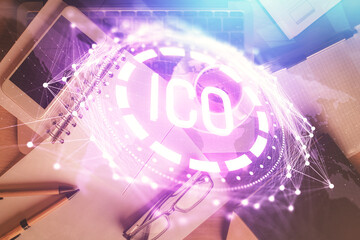 Double exposure of blockchain theme hologram over table with phone. Top view. Crypto technology...