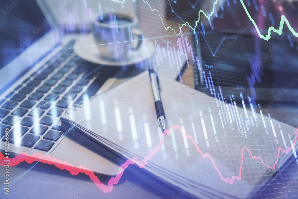 Poster Double exposure of forex chart drawing and desktop with coffee and items on table background. Concept of financial market trading