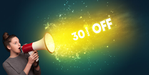 Young woman yelling to loudspeaker with 30% OFF inscription, modern media concept