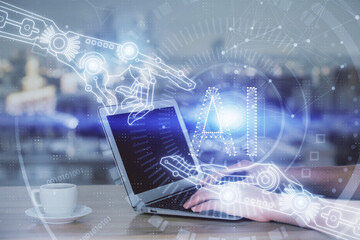 Multi exposure of woman hands working on computer and data theme hologram drawing. Tech concept.